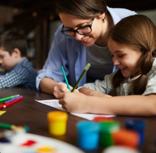 Teacher helping a child